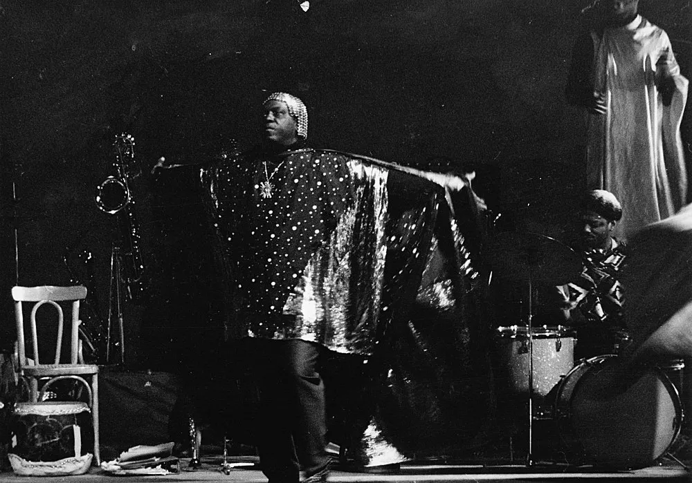 an exhibition organized by Diedrich Diederichsen amp Christopher Müller feat. Marcus Behmer, Stefan George, Rainer Werner Fassbinder, Hans Henny Jahnn, Lutz Bacher, Hans Kayser, Ludwig Gosewitz, Jordan Belson, Hapshash and the Coloured Coat, The Fool, Rogério Duarte, The Red KrayolaMayo Thompson, Walter de Maria, Sigmar Polke, Emil Schult, Isaac Abrams, John McCracken, Pedro Bell, Kai Althoff, Henrik Olesen, Öyvind Fahlström, Karlheinz Stockhausen, Sun Ra, Hartmut Geerken, Albert Oehlen, Jack Goldstein, Jutta Koether, Isa Genzken, Palermo, John Coltrane, Tony Conrad — Cosmic Communities Coming Out Into Outer Space Homofuturism, Applied Psychedelia amp Magic Connectivity — Exhibitions — Galerie Buchholz — Image 00