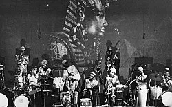 an exhibition organized by Diedrich Diederichsen amp Christopher Müller feat. Marcus Behmer, Stefan George, Rainer Werner Fassbinder, Hans Henny Jahnn, Lutz Bacher, Hans Kayser, Ludwig Gosewitz, Jordan Belson, Hapshash and the Coloured Coat, The Fool, Rogério Duarte, The Red KrayolaMayo Thompson, Walter de Maria, Sigmar Polke, Emil Schult, Isaac Abrams, John McCracken, Pedro Bell, Kai Althoff, Henrik Olesen, Öyvind Fahlström, Karlheinz Stockhausen, Sun Ra, Hartmut Geerken, Albert Oehlen, Jack Goldstein, Jutta Koether, Isa Genzken, Palermo, John Coltrane, Tony Conrad — Cosmic Communities Coming Out Into Outer Space Homofuturism, Applied Psychedelia amp Magic Connectivity — Exhibitions — Galerie Buchholz — Image 246